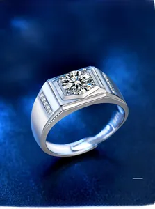 Macro detail of S925 sterling silver men's ring with large moissanite and side stones
