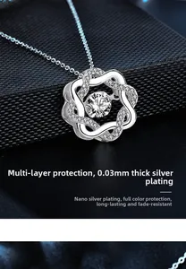Detail of interlocking petal pendant with a dancing moissanite and thick silver plating