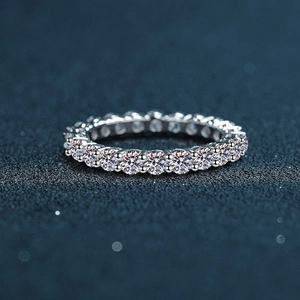 Sparkling 925 sterling silver eternity ring with round cubic zirconia in claw setting
