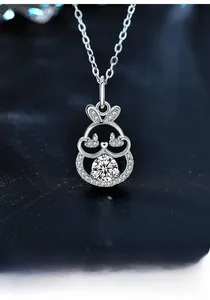 Detailed view of S925 silver rabbit pendant featuring a large moissanite and pave diamonds