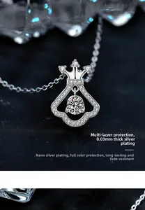 Close-up of crown skirt pendant with brilliant moissanite and nano-plating detail