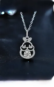 Detail of 925 silver rabbit pendant showing 3EX cut stone and eight hearts and arrows
