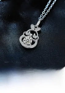 Close-up of S925 silver rabbit necklace with moissanite pendant and micro-pave details