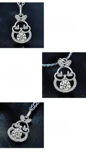 Detailed views of S925 silver rabbit pendant with brilliant moissanite in three-prong setting