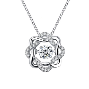 Elegant 925 sterling silver star necklace with dancing moissanite pendant on white background