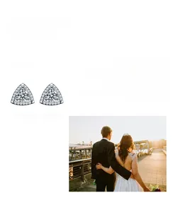 Macro detail of triangle moissanite stud earrings in 925 sterling silver halo setting