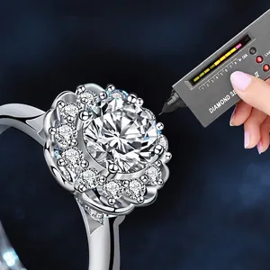 Classic 1-carat moissanite ring in 925 sterling silver tested with diamond selector pen