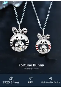 Macro view of 925 silver rabbit pendant with moissanite stone and enamel detailing