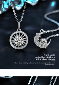 Detail of sun and moon pendants with 925 silver plating and sparkling micro-inlaid stones