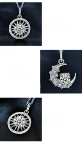 Close-up of S925 silver sun and moon pendants with moissanite in a four-prong setting
