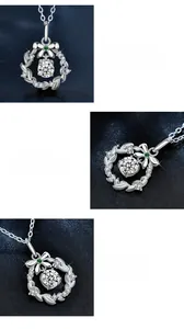 Détails du pendentif en moissanite avec nœud en argent et motif de couronne