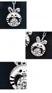 Detail of bunny pendant with round moissanite in three-claw setting and S925 silver finish