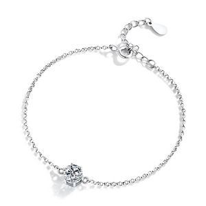 Minimalist 925 sterling silver bracelet with a brilliant round moissanite in six-prong setting