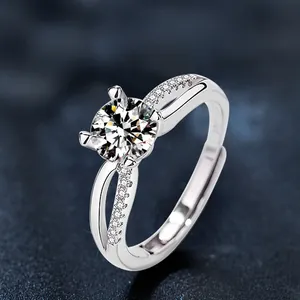 Detail of 925 sterling silver ring with cross pavé band and adjustable opening