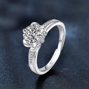 Macro view of adjustable fleur-de-lis sterling silver ring with sparkling petals
