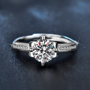 Close-up of 925 silver iris flower ring with large round-cut diamond and adjustable band