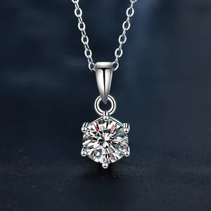 Macro detail of a 925 sterling silver 1 carat moissanite necklace with six-prong setting