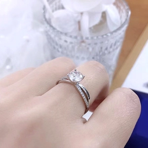 925 silver hollow moissanite ring with dual-line crossover design and four-prong setting
