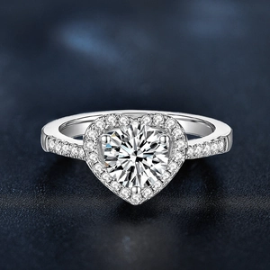 Macro shot of 1-carat moissanite heart ring in S925 sterling silver with halo diamonds
