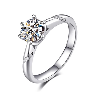 Classic six-prong 925 sterling silver ring featuring a brilliant round moissanite stone
