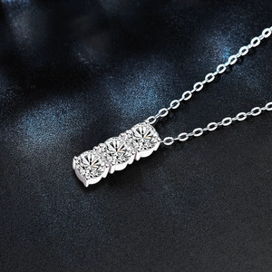 925 silver necklace with three round-cut moissanite stones on a minimalist chain