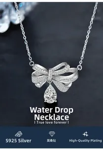Macro view of S925 silver bow necklace with pear-cut moissanite stone and plating detail