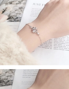 Détail du bracelet en argent 925 avec pendentif lune et pierre de moissanite brillante