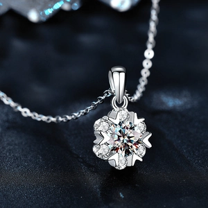 Macro view of 925 silver snowflake pendant necklace with sparkling moissanite stone