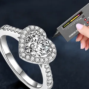 Heart-shaped moissanite ring in 925 sterling silver passing a diamond tester test