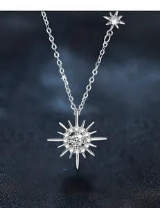 Detail of 3EX cut moissanite sunburst necklace showing 58 facets and fire brilliance