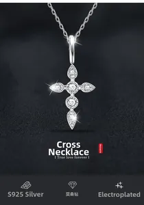 Macro shot of S925 sterling silver cross necklace with brilliant moissanite stone settings