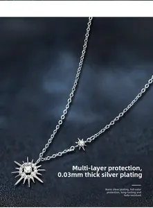 Macro detail of sunburst star pendant with sterling silver plating and nano color retention