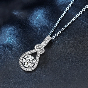 Elegant 925 sterling silver necklace with teardrop pendant and moissanite center stone