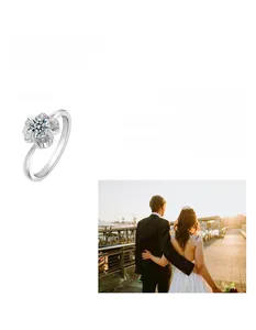 Detail of s925 silver moissanite ring with six-prong petal setting and wedding scene