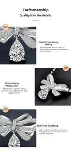 Detail of moissanite pendant with pear-cut stone and bow-shaped silver setting