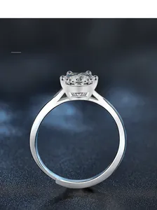 Detail of S925 sterling silver ring featuring a square-cut moissanite in a 4-claw setting