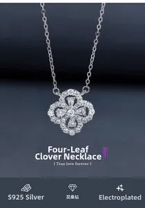 Détail macro du pendentif trèfle en argent S925 avec des pierres de moissanite