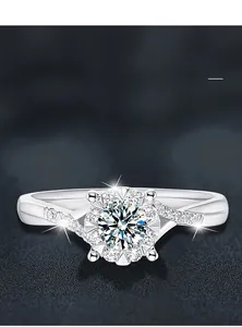 Detailed macro shot of a four-prong Moissanite ring with a twisted pavé band design