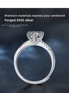 Close-up of S925 sterling silver ring featuring a six-prong moissanite and adjustable band