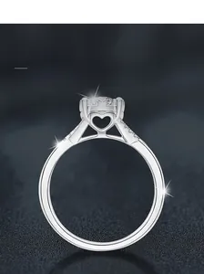 Macro shot of S925 sterling silver ring featuring a heart-shaped moissanite setting