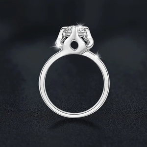Exquisite S925 sterling silver moissanite ring with crown setting on black background