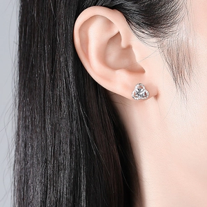 Elegant S925 sterling silver clover stud earring with moissanite stones on earlobe