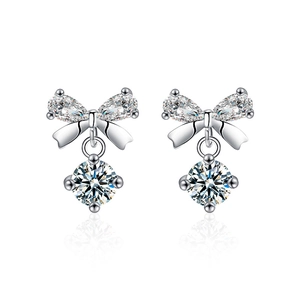 Elegant S925 sterling silver bow earrings featuring pear and round cut moissanite stones