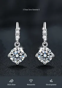 Detail of S925 sterling silver four-prong moissanite earrings with tassel chain design