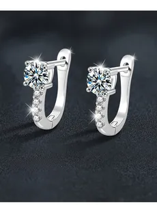 Macro shot of S925 sterling silver U-shaped earrings with 3EX cut moissanite stones