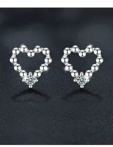 Detail view of heart-shaped S925 silver stud earrings with sparkling moissanite gem