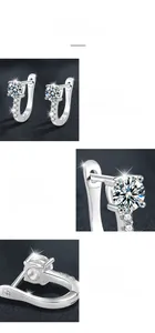 Macro shot of Moissanite U-shape hoop earrings with classic four-prong setting
