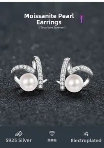 Detail of S925 silver stud earrings with moissanite stones and natural freshwater pearls