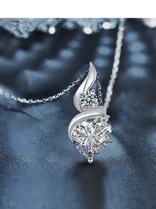 Macro shot of S925 sterling silver heart pendant with sparkling moissanite main stone