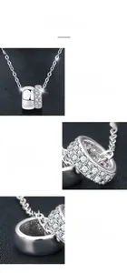 Macro shot of S925 silver double-circle necklace with pavé-set moissanite details